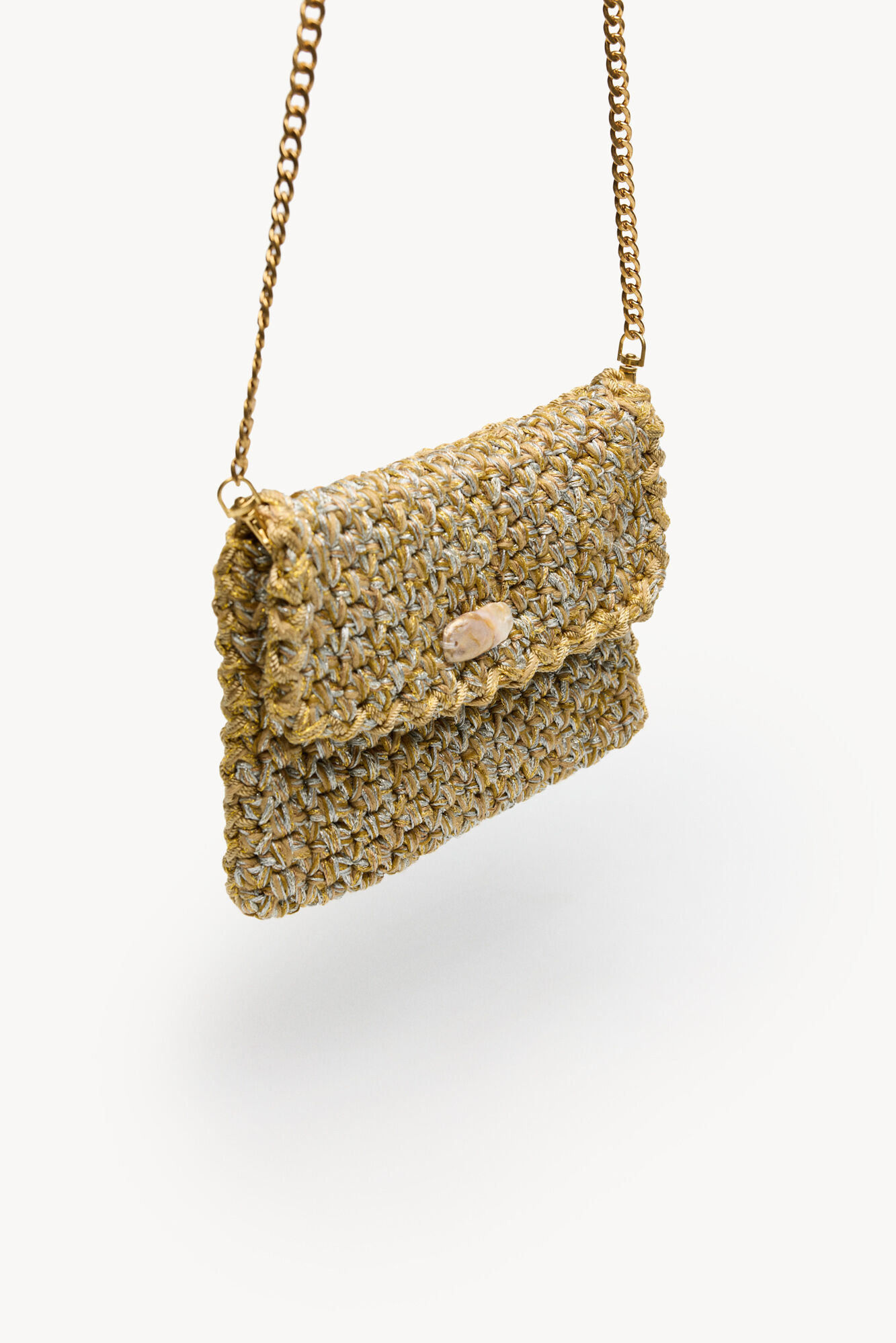Hoss Intropia Numa. Bolsa trenzada de tejido Dorado