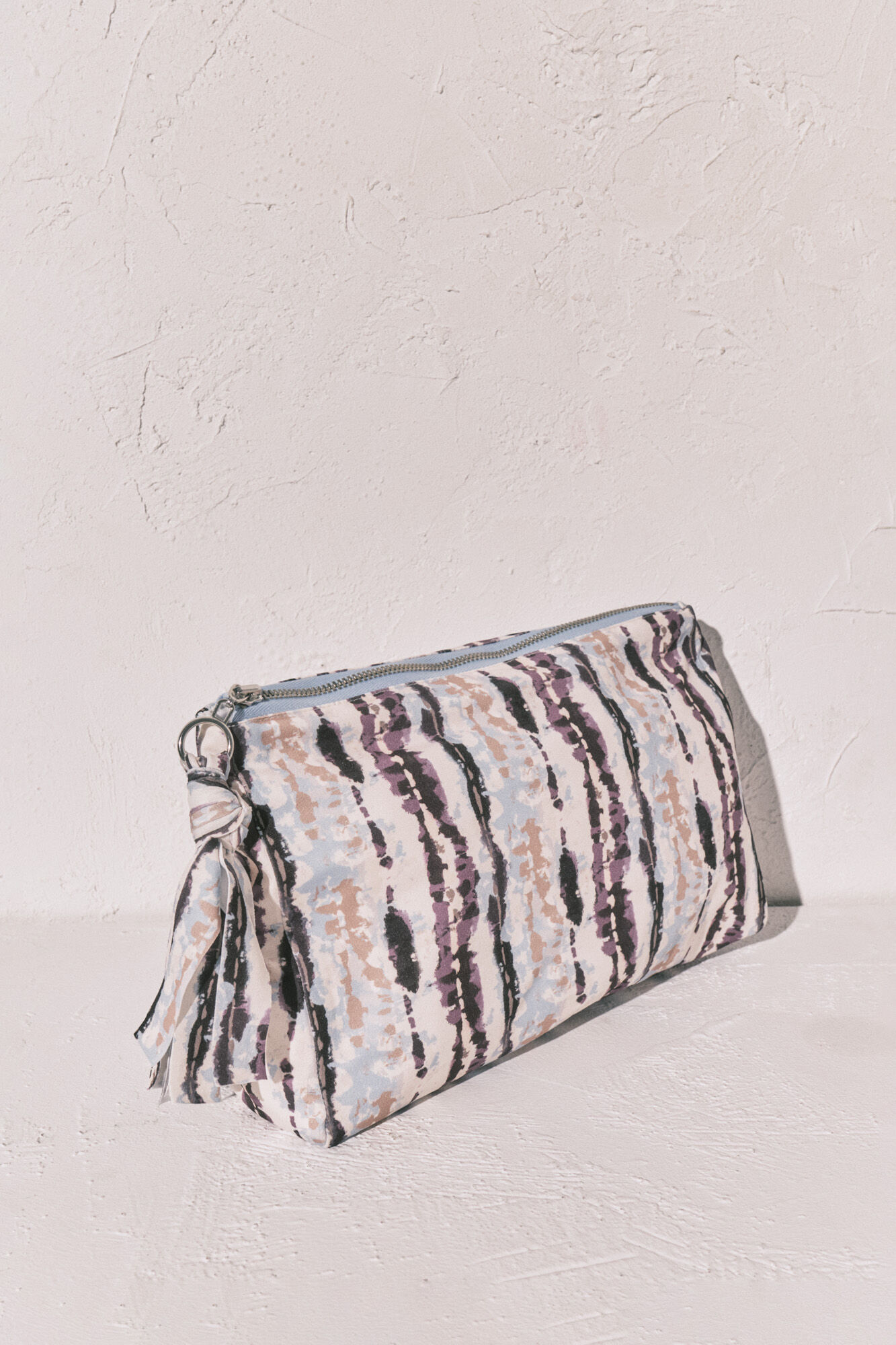 Women'secret Bolsa impermeable Tie Dye para traje de ba&ntilde;o caf&eacute; estampado