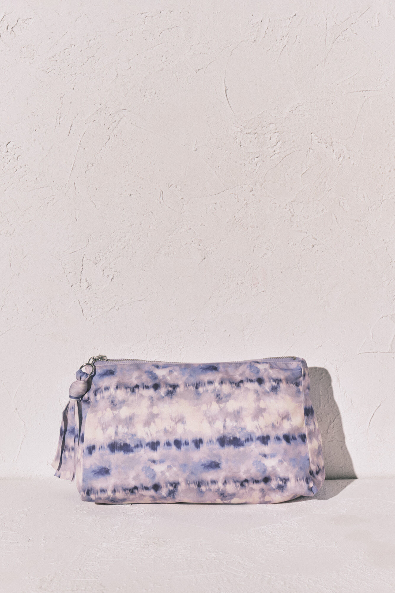 Women'secret Bolsa para traje de ba&ntilde;o y bikini impermeable Tie Dye lila estampado