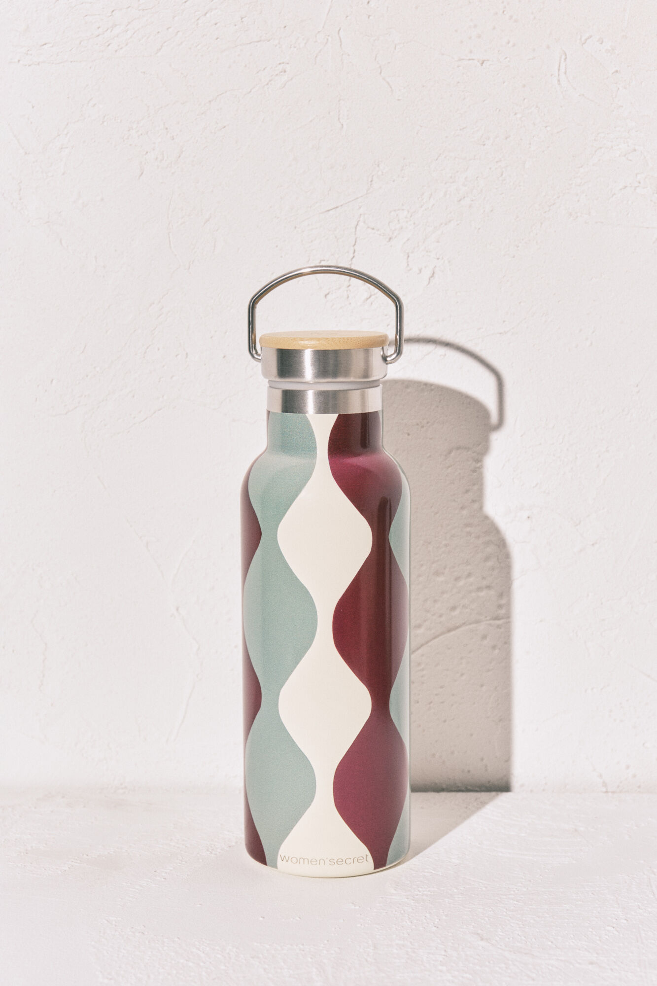 Women'secret Botella de acero inoxidable con ondas
